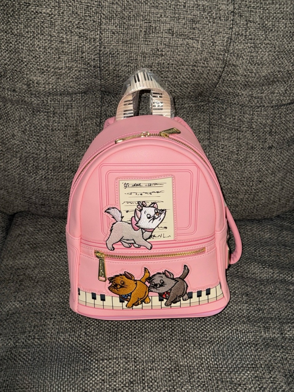 Aristocats piano backpack